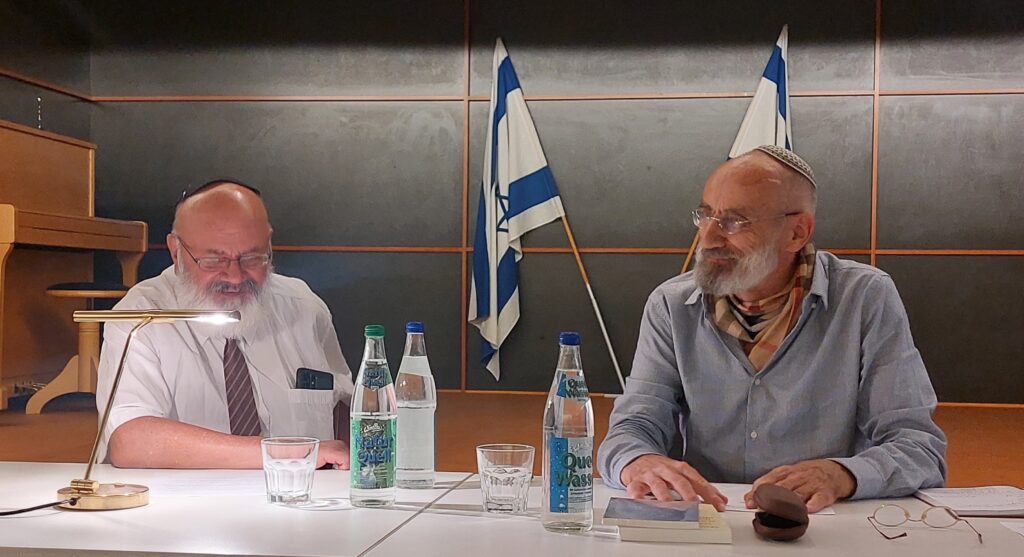 Arieh Martin Rudolph auf dem Podium mit dem Schriftsteller Chaim Noll